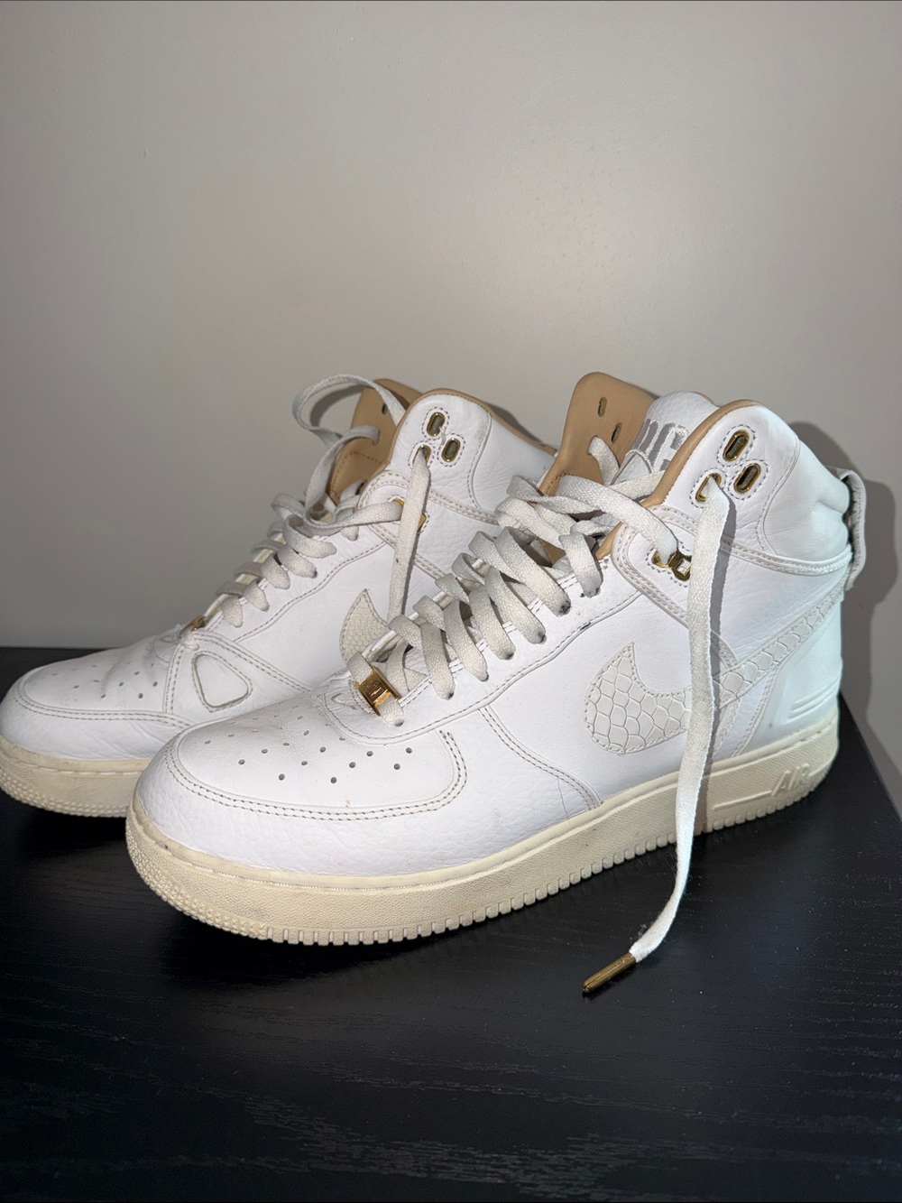 Nike Men’s White High-Top Sneakers with Gold Eyelets